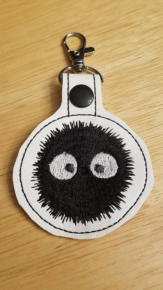 Black dustball Embroidered Keychain